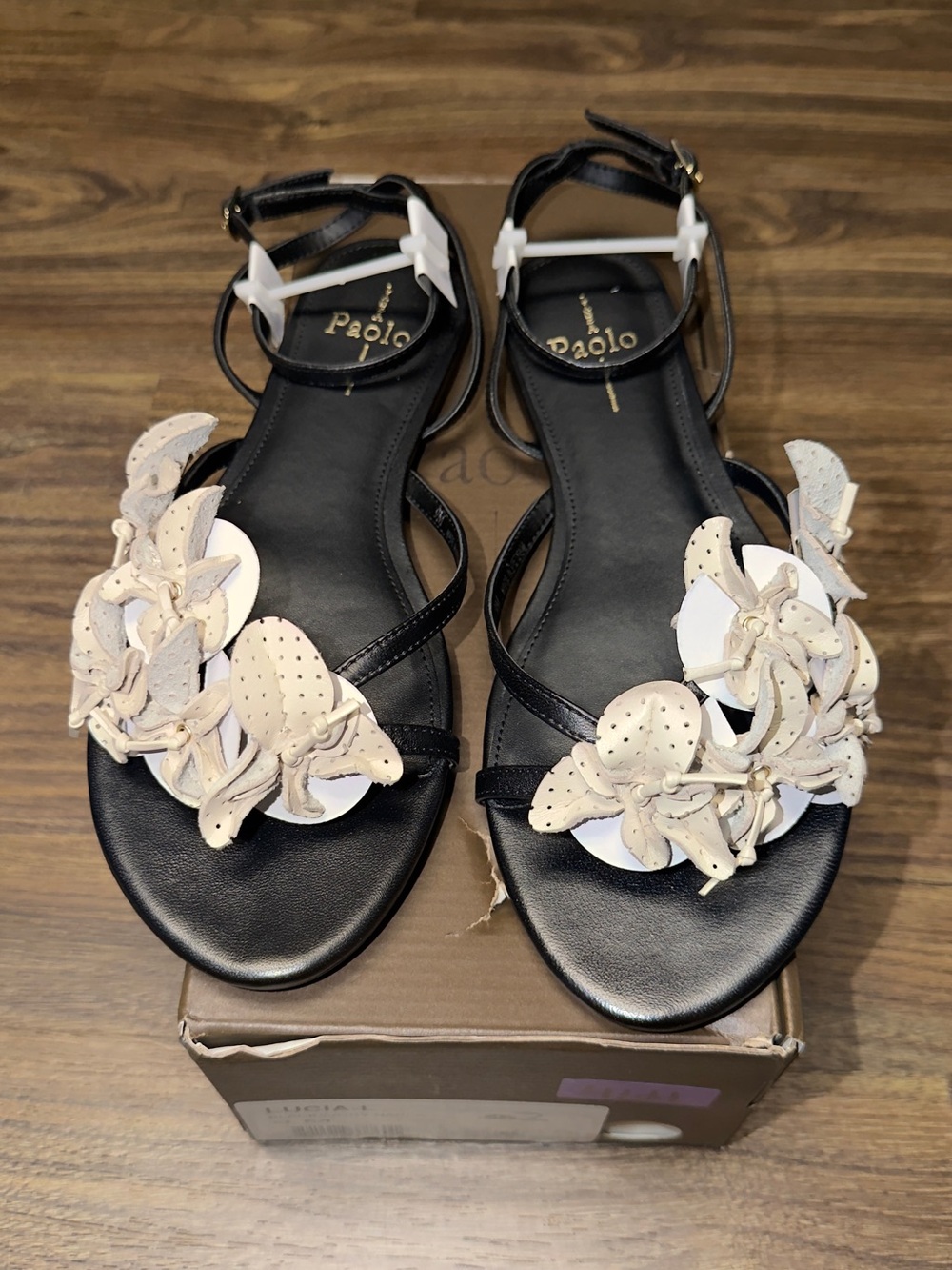 Linea Paolo Black Sandals with Cream Floral Embellishments